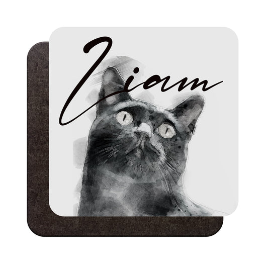 A glossy wood backed coaster shown from both sides, featuring a watercolour black cat art print and personalised name, shown against a white backdrop
