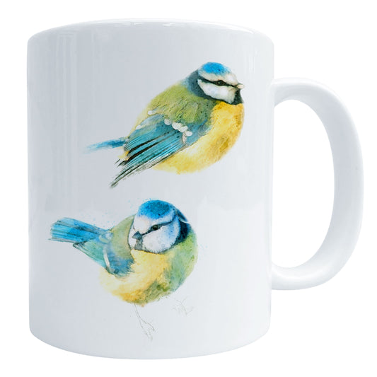 A glossy white ceramic coffee mug featuring a watercolour bird art print comprising of two blue tits, shown against a white backdrop.