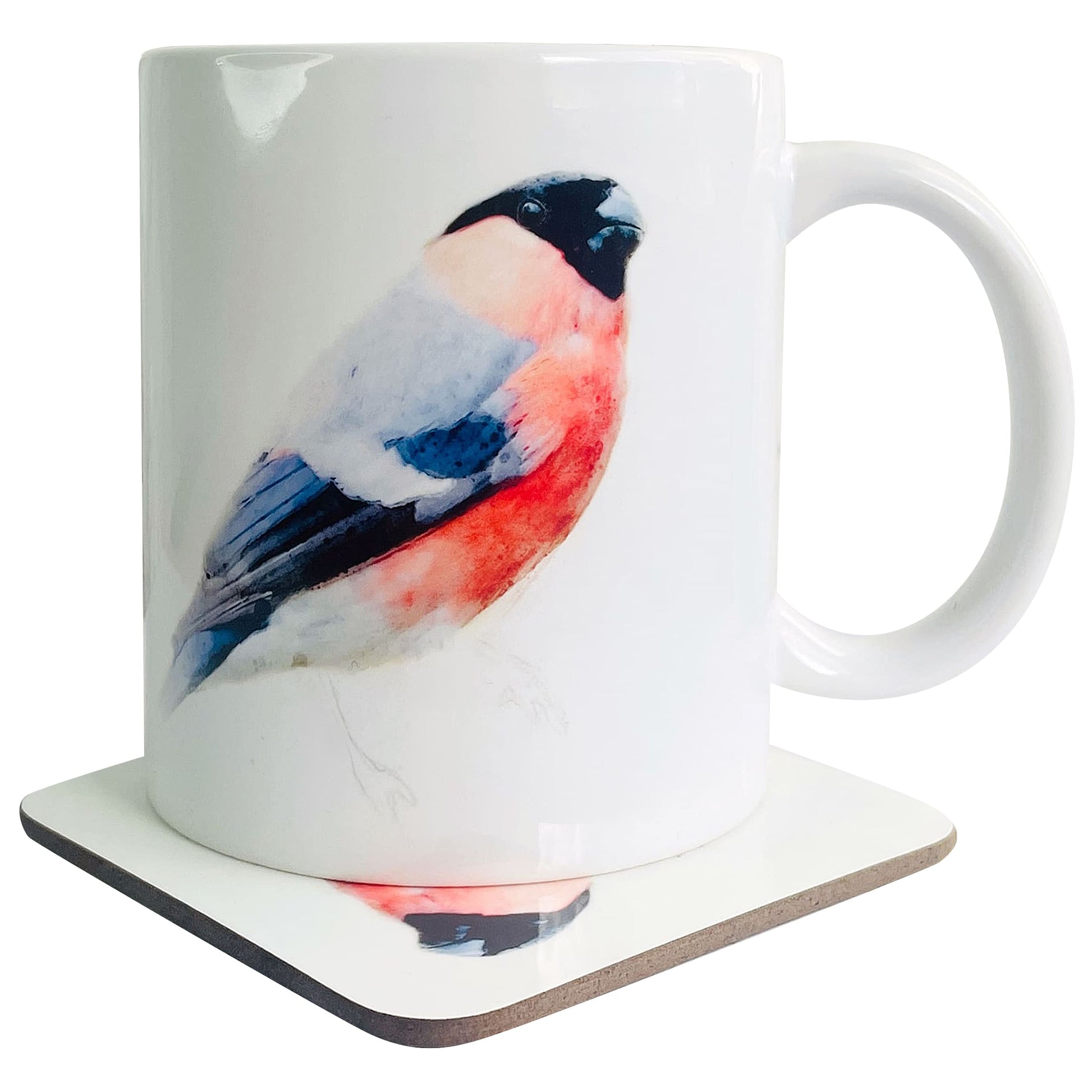 A glossy white ceramic mug with a watercolour bullfinch bird art print on top of a wooden coaster featuring a matching print, shown against a white backdrop.
