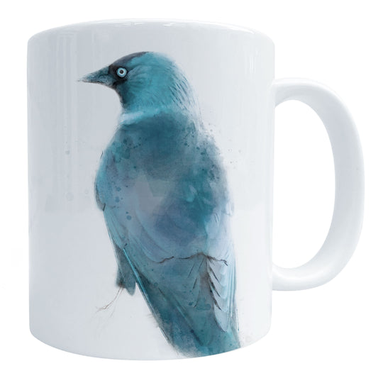 a glossy white ceramic coffee mug with a blue watercolour jackdaw bird art print, shown against a white backdrop